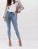 Jeans skinny con bottoni