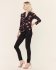 Top a fiori con scollo a V