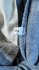 Tuta in denim con balza