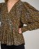 Blusa con stampa geo bronzo
