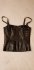 Top in pelle con zip