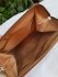 Pochette in pelle e pvc