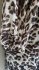 Abito leopardato con scollo a V