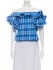 Top azzurro con spalle scoperte