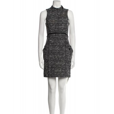 Abito in tweed smanicato