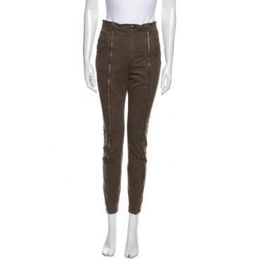 Pantaloni con zip verdi